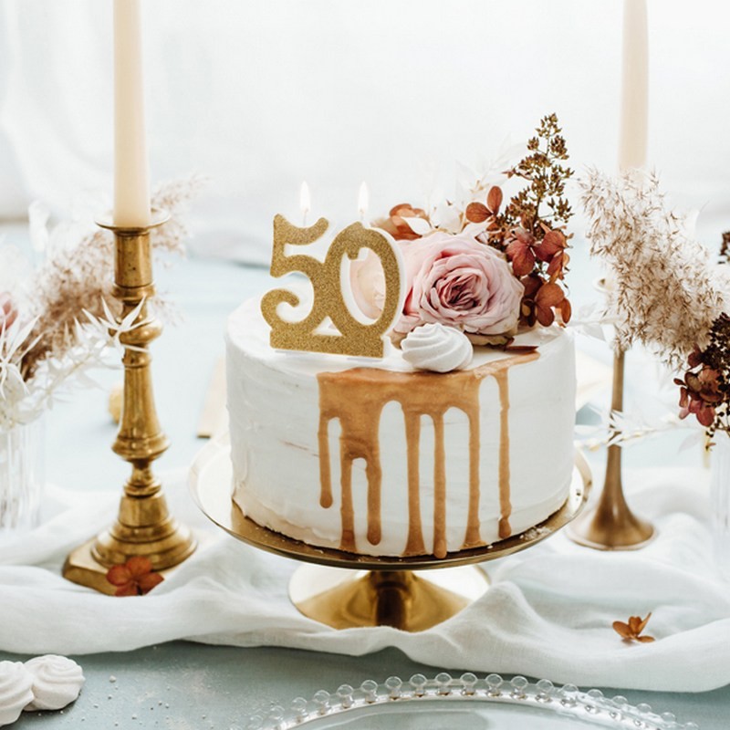Świeczka na 50 urodziny złota tort